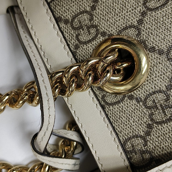 Padlock Small Monogram Coated Canvas Beige