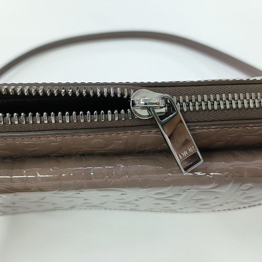 Authenticated pre-owned  Saddle Monogram Patent Leather Grey - Shoulder Bag at Looply