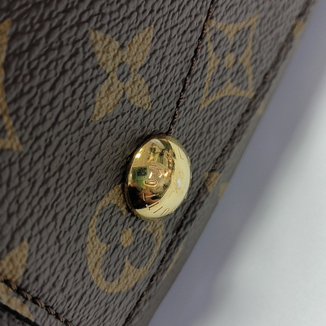 MONTAIGNE Monogram Coated Canvas Brown