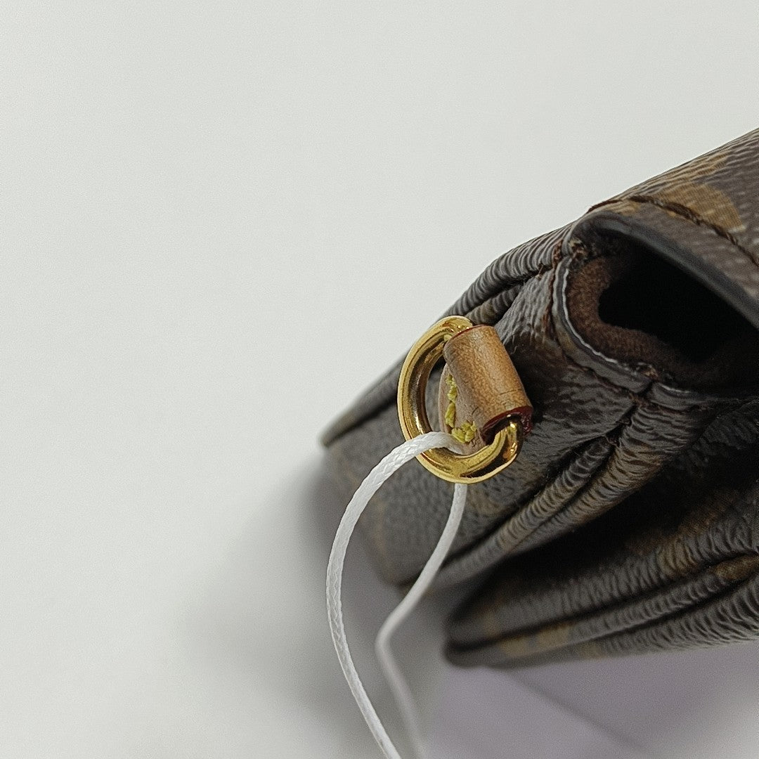 MÉTIS Micro Monogram Coated Canvas Brown