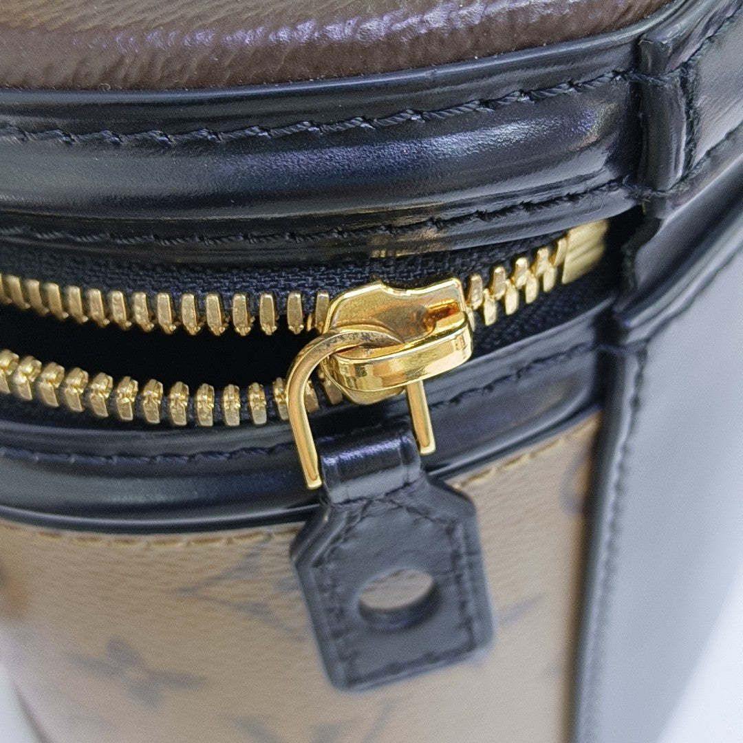 CANNES PM Monogram Coated Canvas Brown