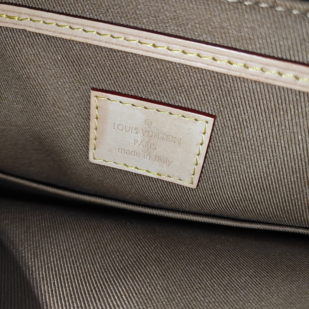 EXCURSION PM Monogram Coated Canvas Brown