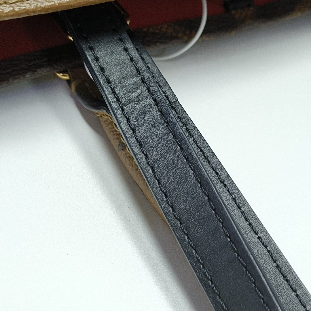 ONTHEGO MM Monogram Coated Canvas Brown
