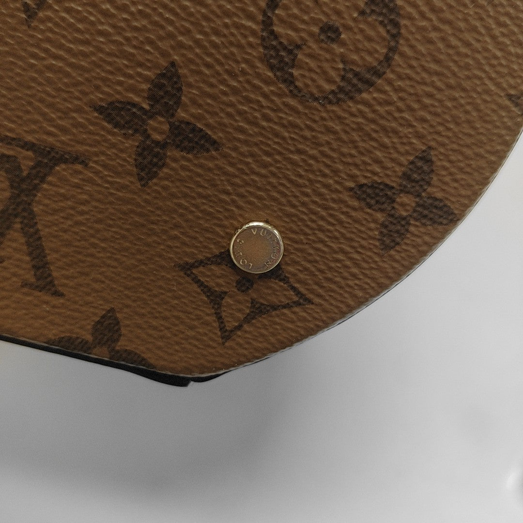 CANNES PM Monogram Coated Canvas Brown