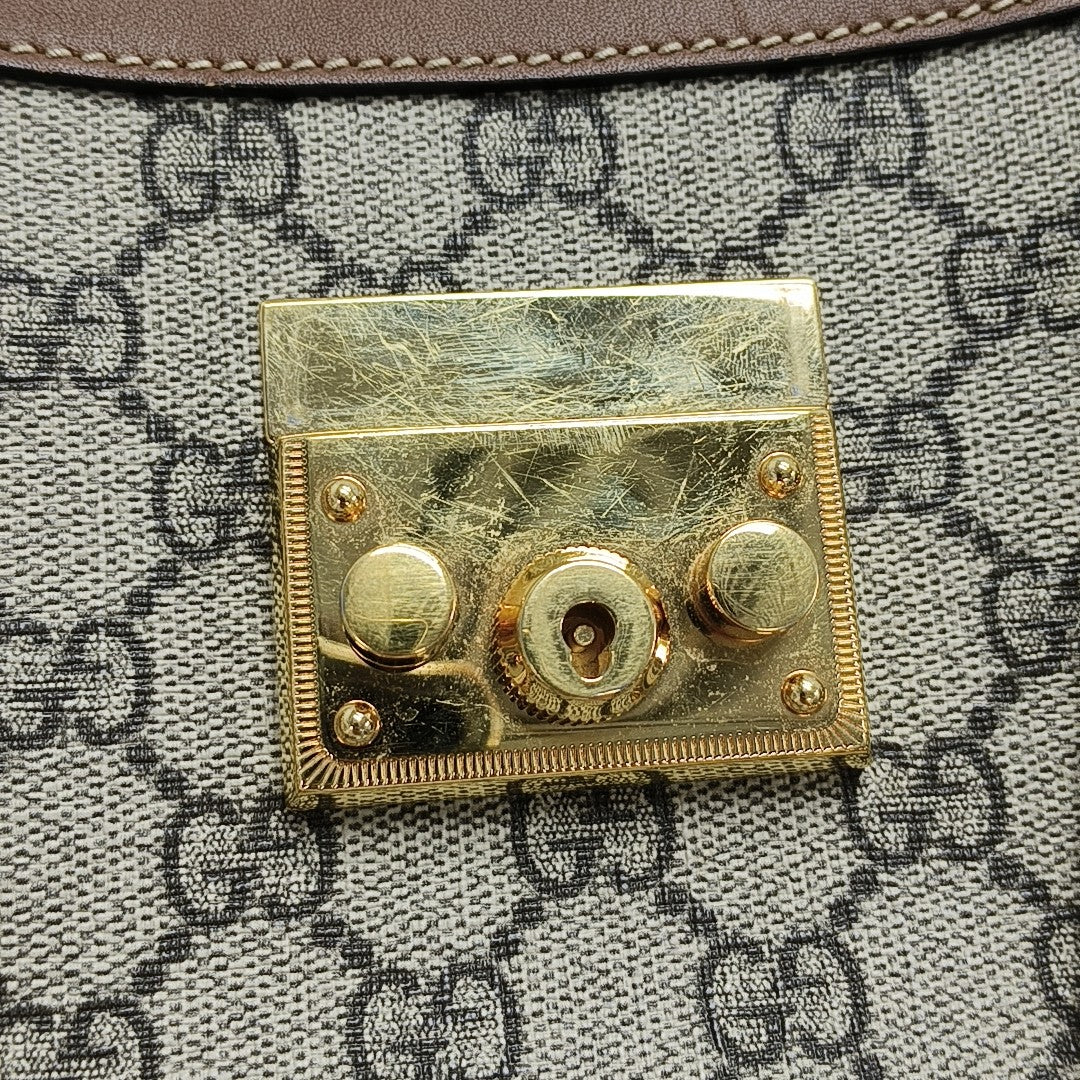 Padlock Small Monogram Coated Canvas Beige