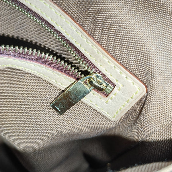 LOOPING PM Monogram Coated Canvas Brown