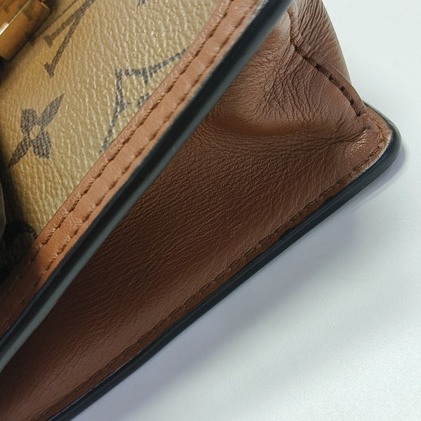 DAUPHINE WOC Monogram Coated Canvas Brown