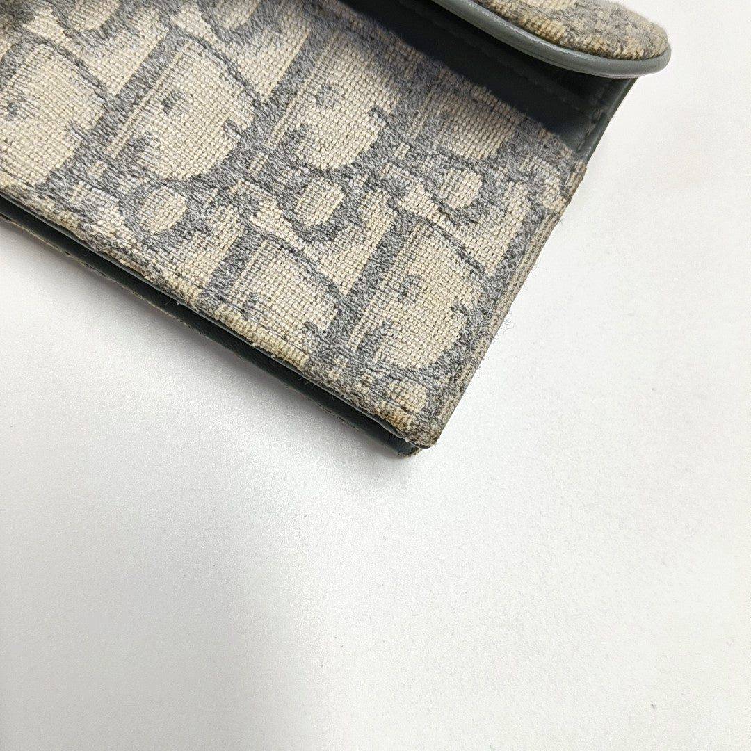 Authenticated pre-owned  Saddle Oblique Canvas Gray Wallet - Wallet at Looply