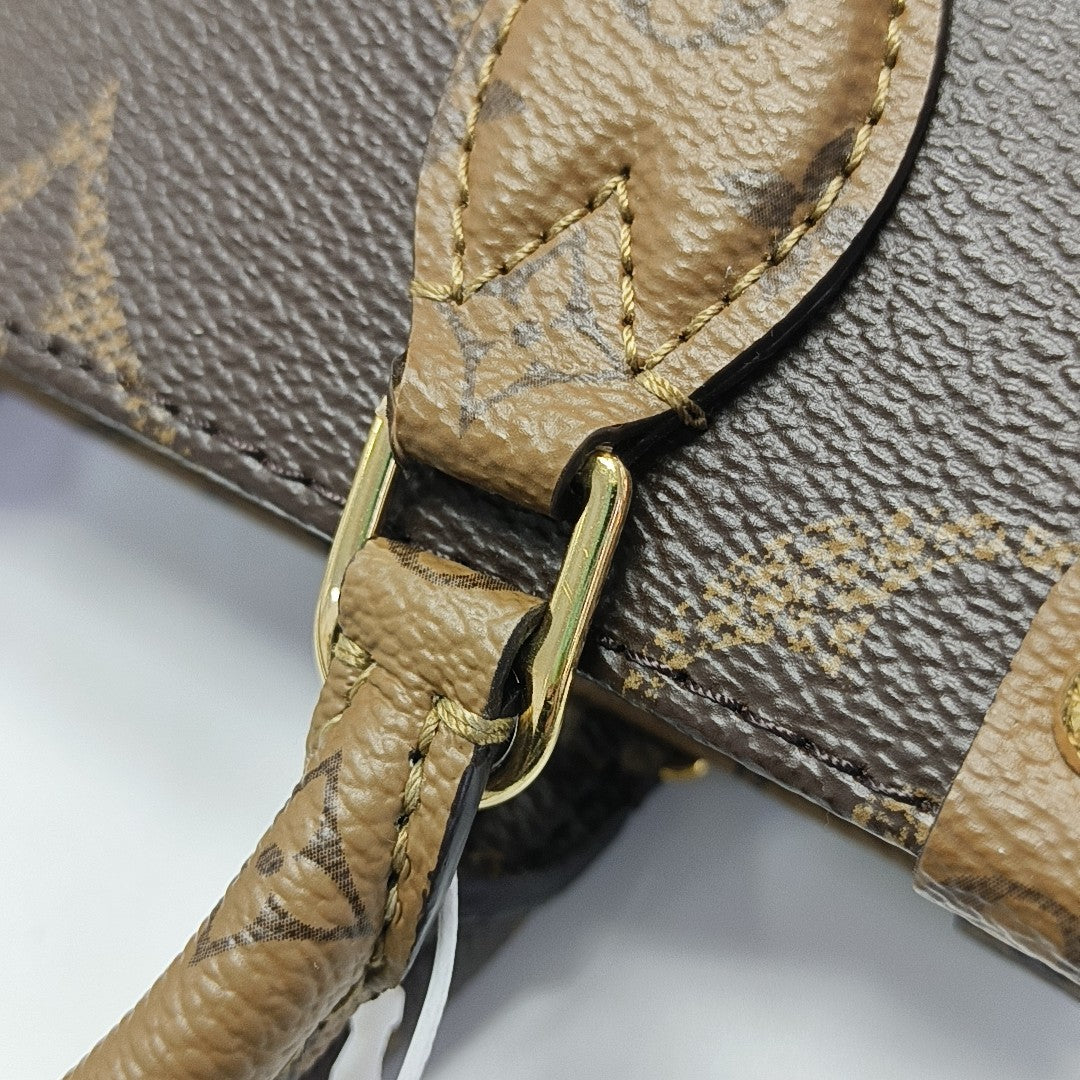 ONTHEGO BB Monogram Coated Canvas Brown