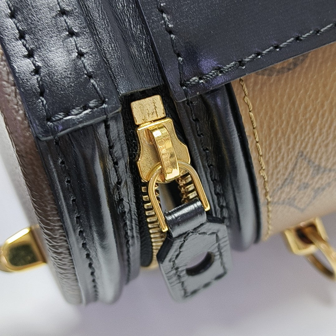 CANNES PM Monogram Coated Canvas Brown