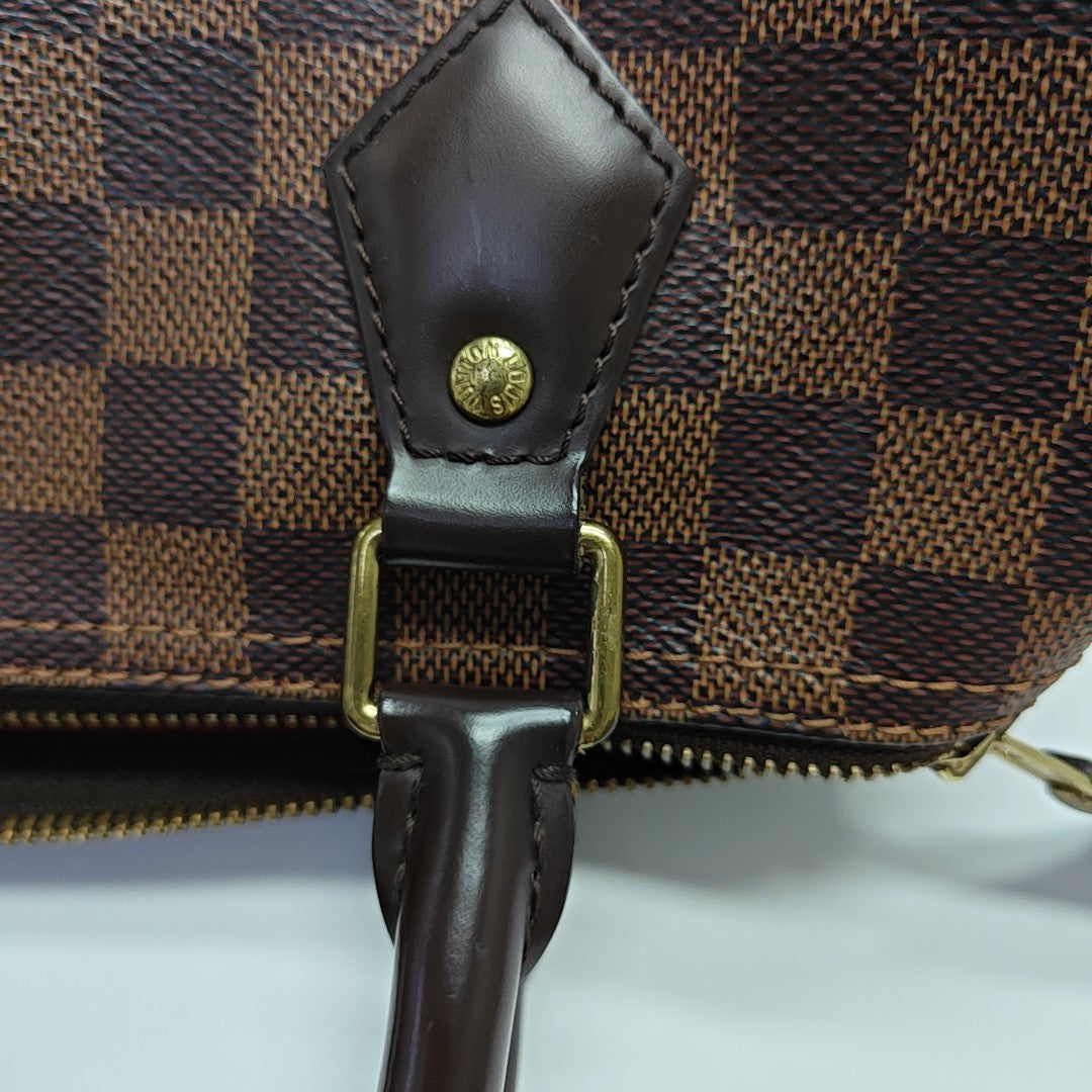 SPEEDY 25 Damier Ebene Coated Canvas Brown