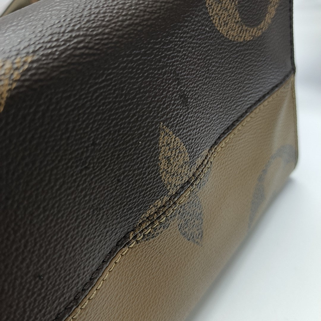 ONTHEGO MM Monogram Coated Canvas Brown