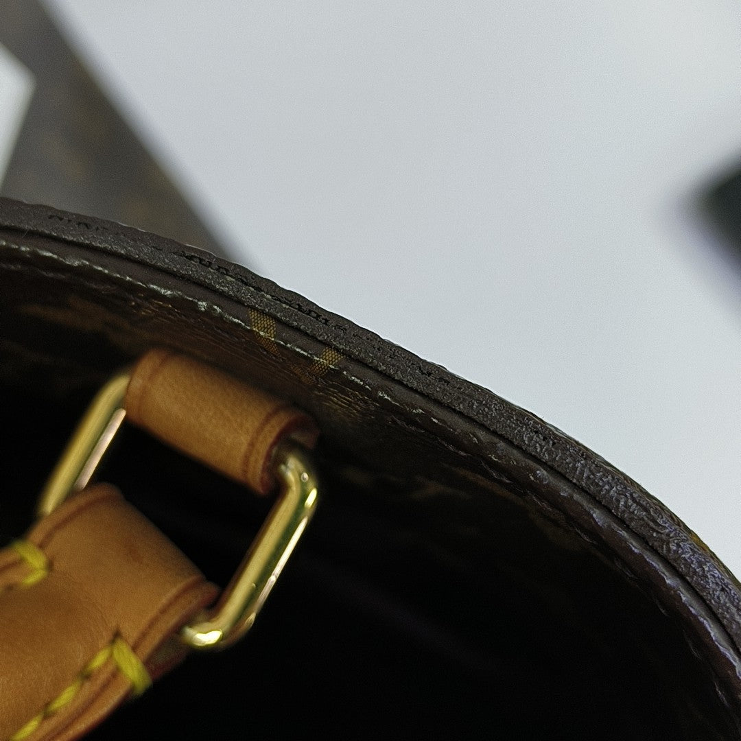 MONTAIGNE Monogram Coated Canvas Brown