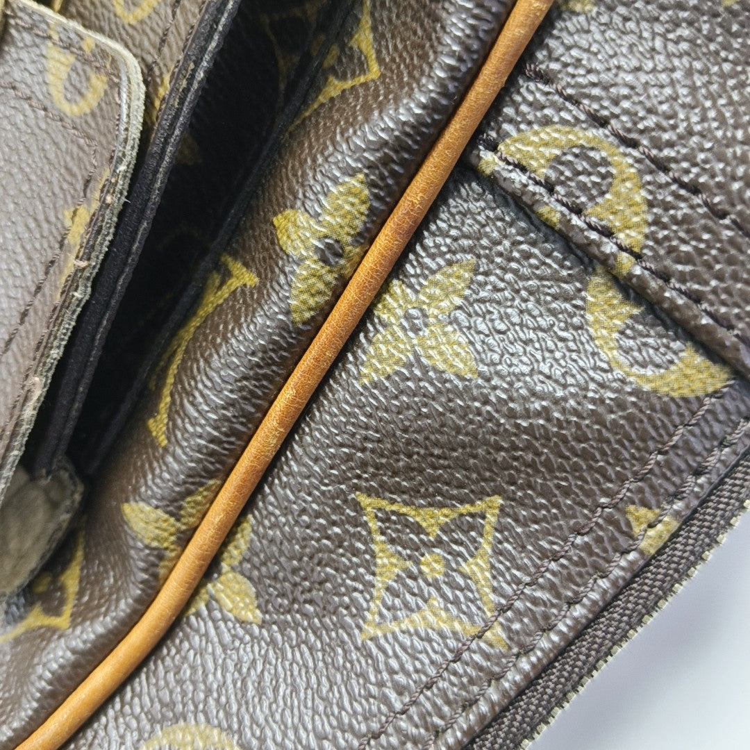MANHATTAN GM Monogram Coated Canvas Brown