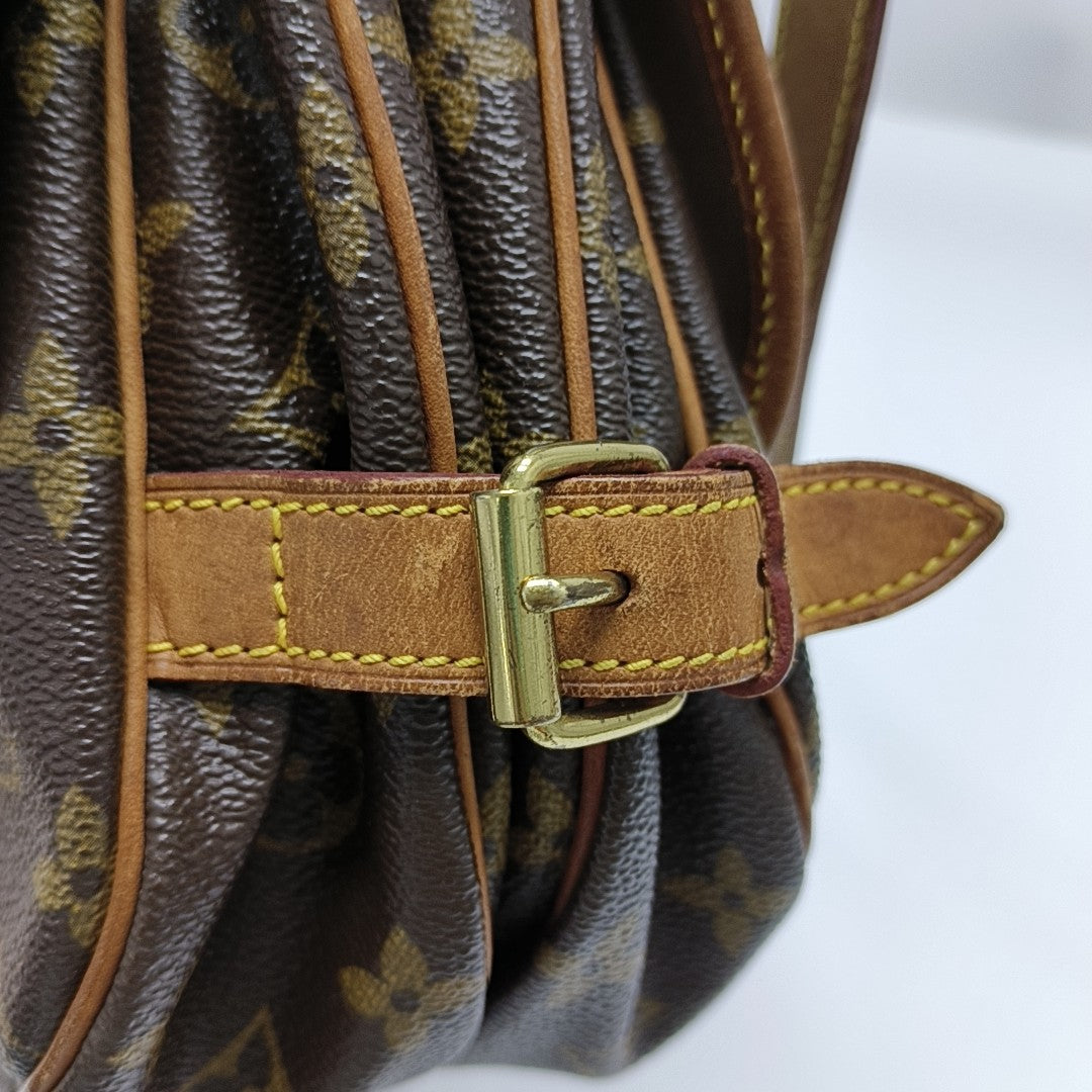 SAUMUR Monogram Coated Canvas Brown
