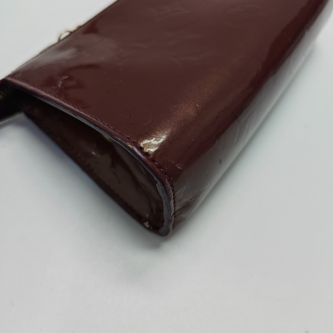 Monogram Patent Leather Clutch Red