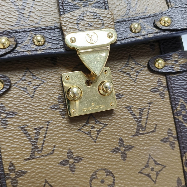 TRUNK Monogram Coated Canvas Brown