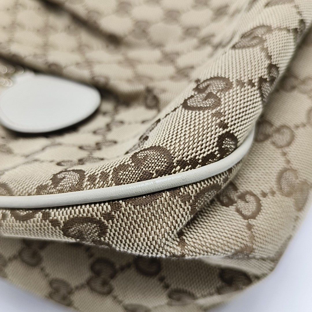 Sukey Monogram Canvas Brown
