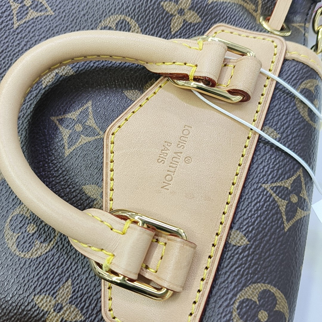 EXCURSION PM Monogram Coated Canvas Brown