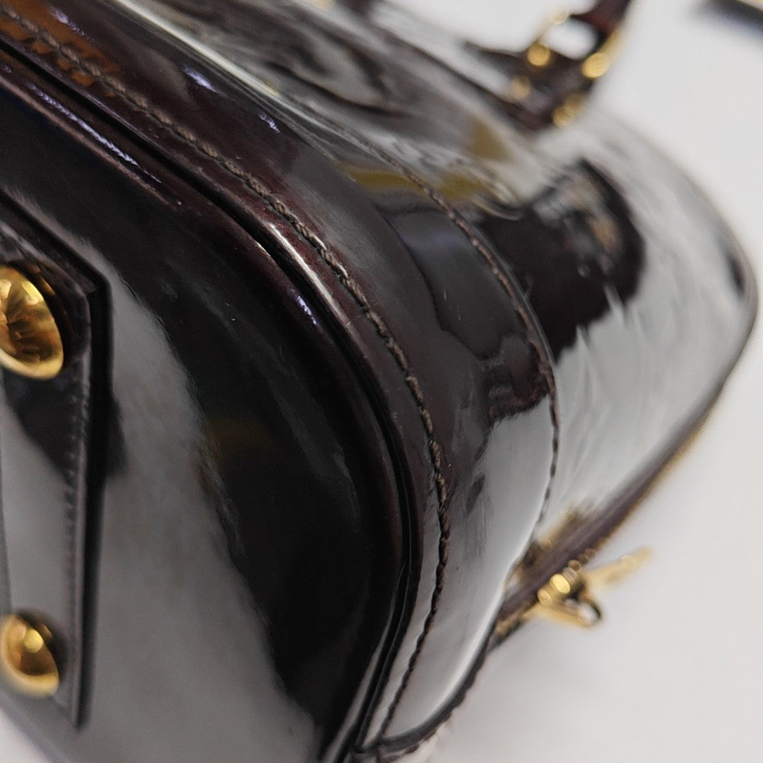 ALMA PM Monogram Patent Leather Red