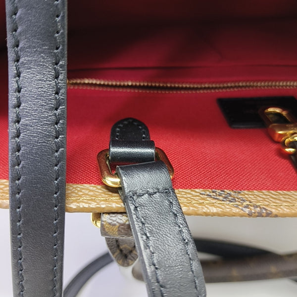 ONTHEGO MM Monogram Coated Canvas Brown