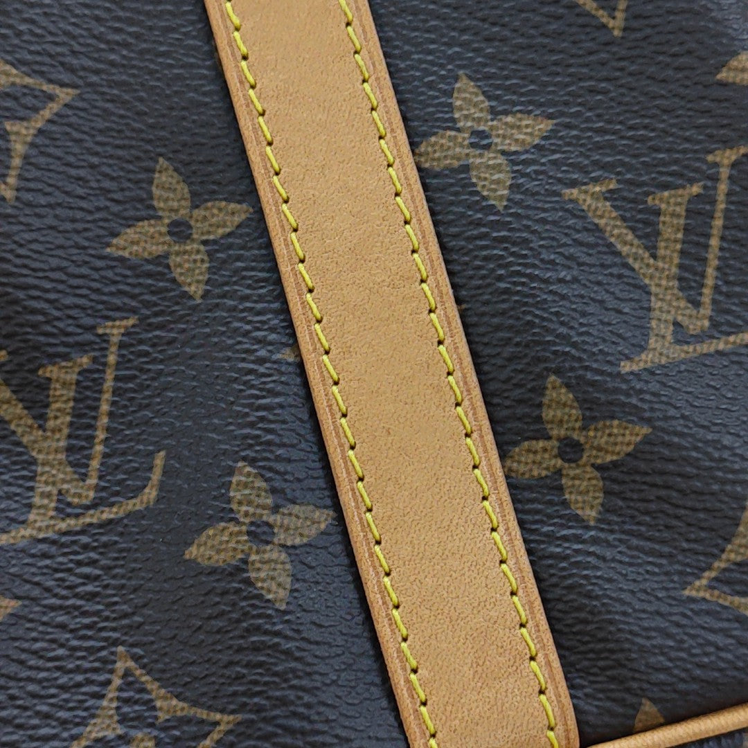SPEEDY 25 Monogram Coated Canvas Brown