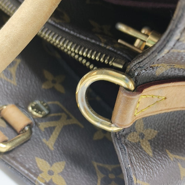 MONTAIGNE GM Monogram Coated Canvas Brown