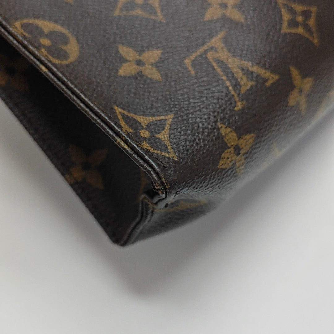 TOILET POCKET 26 Monogram Coated Canvas Brown