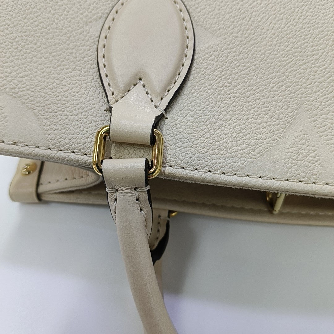 ONTHEGO PM Monogram Calfskin Beige
