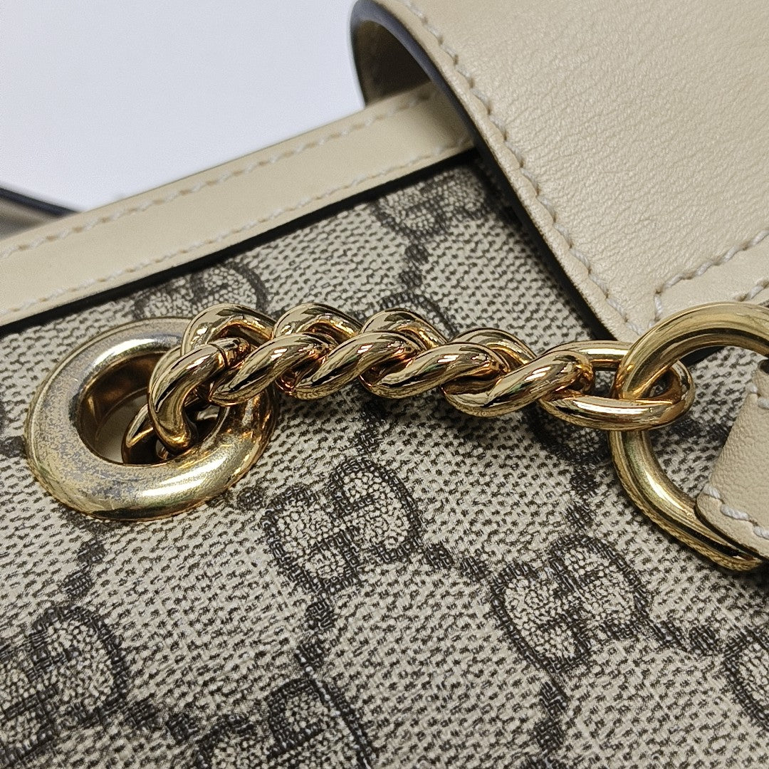 Padlock Small Monogram Coated Canvas Beige