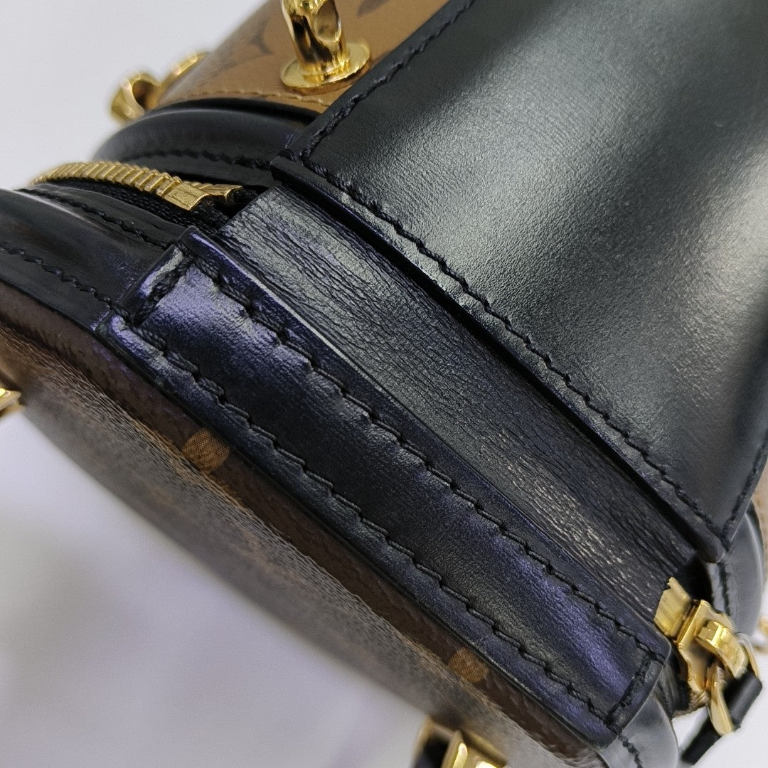 CANNES PM Monogram Coated Canvas Brown