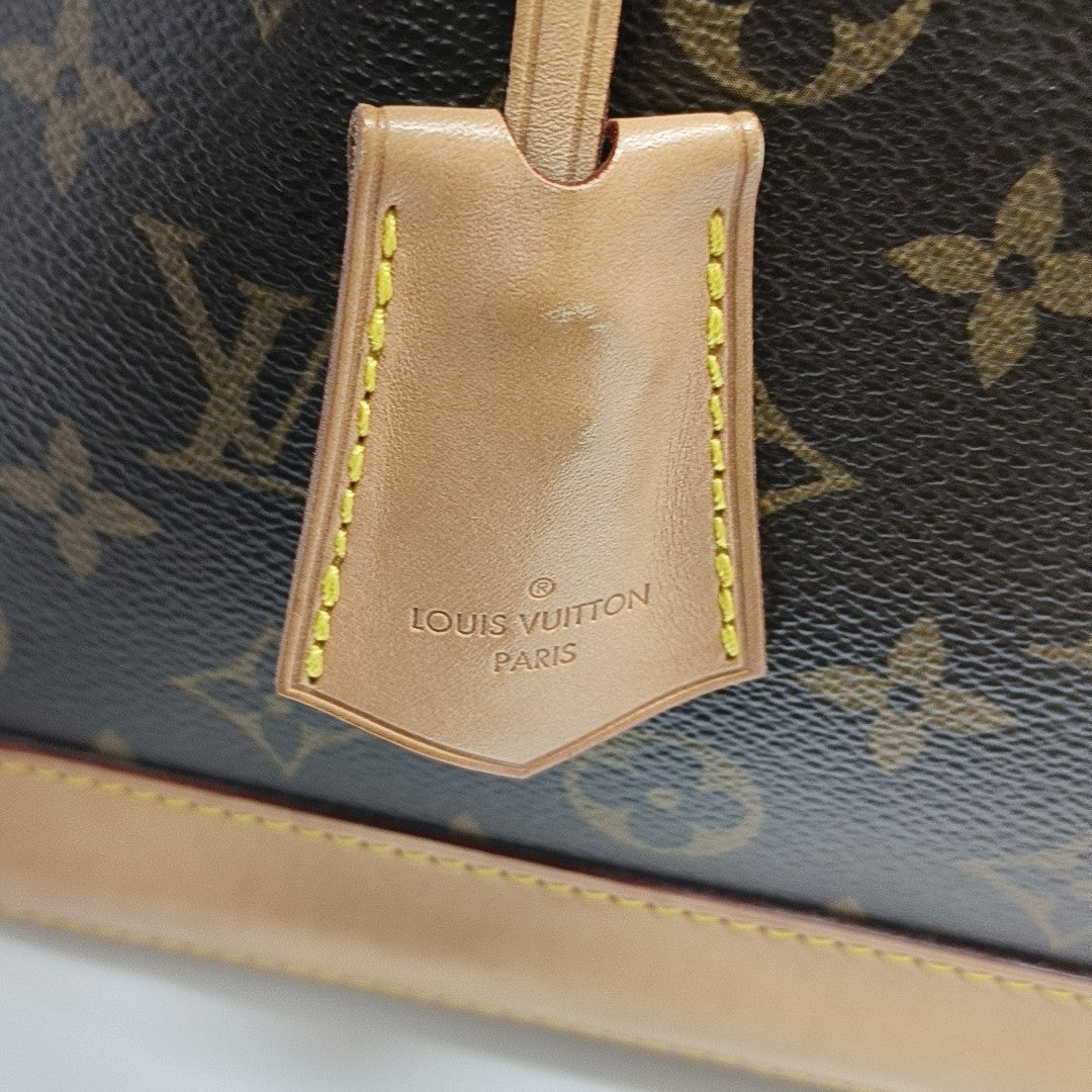 ALMA PM Monogram Coated Canvas Brown