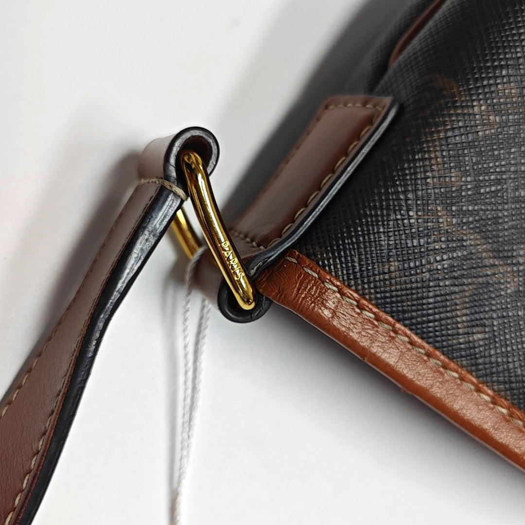 Authenticated pre-owned  TRIOMPHE CANVAS Coated Canvas Brown - Shoulder Bag at Looply