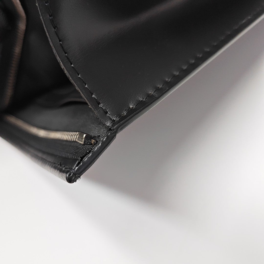 Pochette Voyag MM Monogram Coated Canvas Black