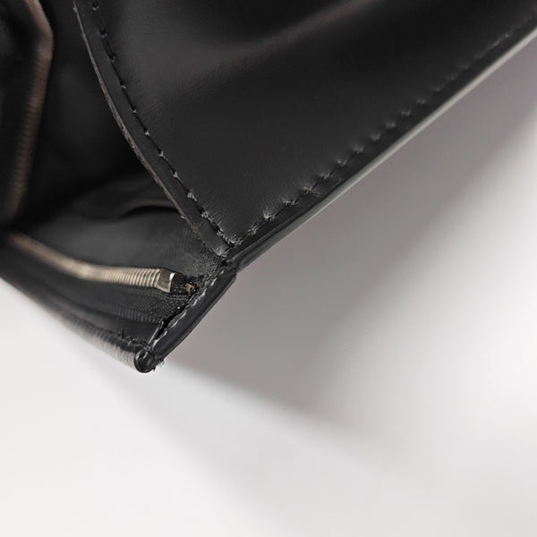 Pochette Voyag MM Monogram Coated Canvas Black