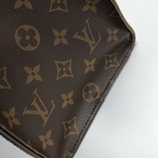 ONTHEGO MM Monogram Coated Canvas Brown