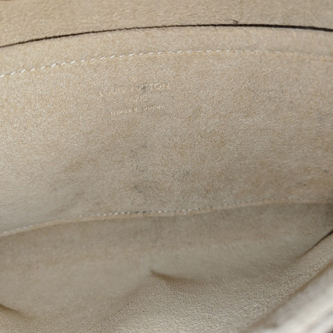 TWIN GM Monogram Coated Canvas Brown