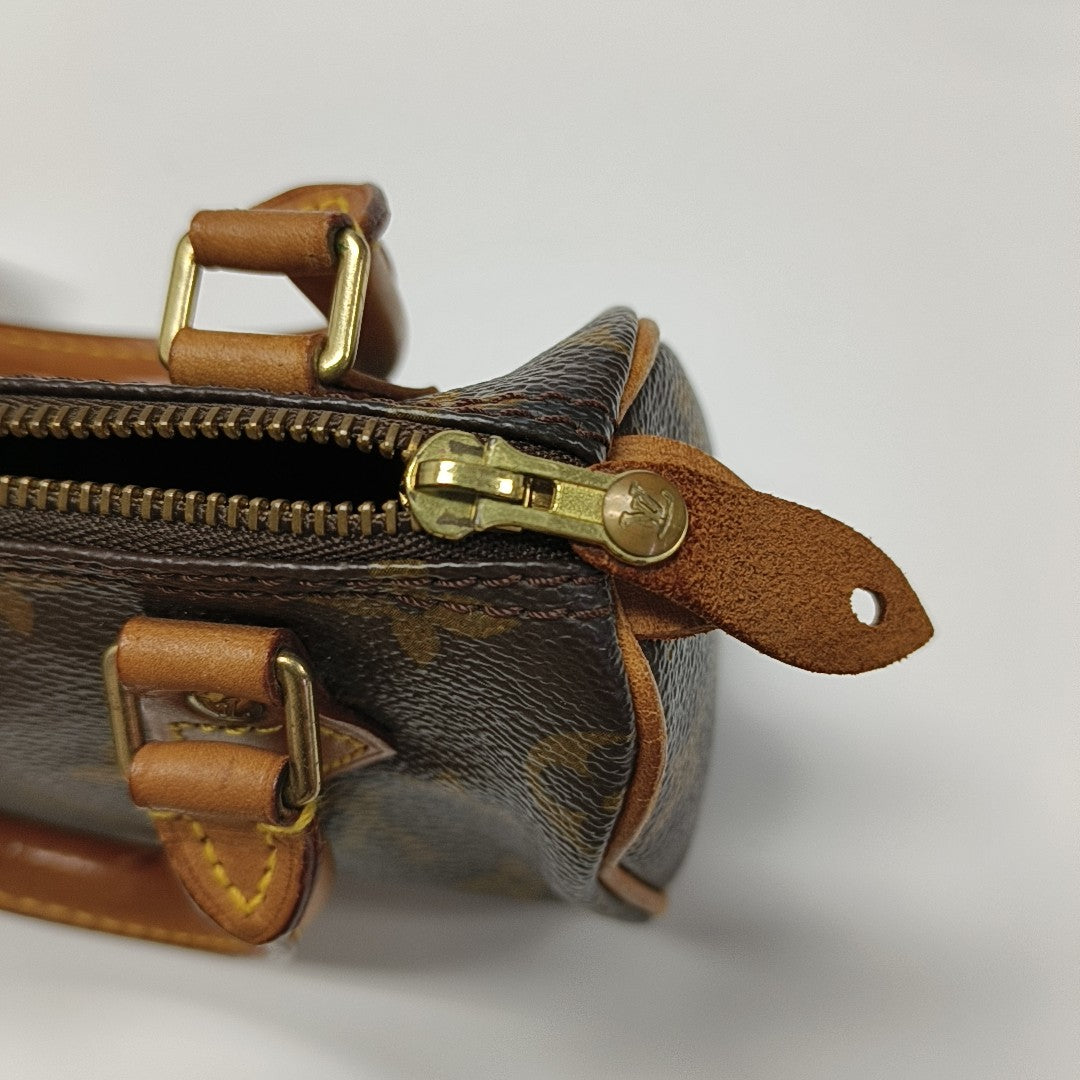 SPEEDY Monogram Coated Canvas Brown