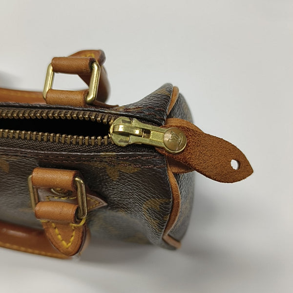 SPEEDY Monogram Coated Canvas Brown