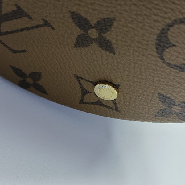 CANNES PM Monogram Coated Canvas Brown