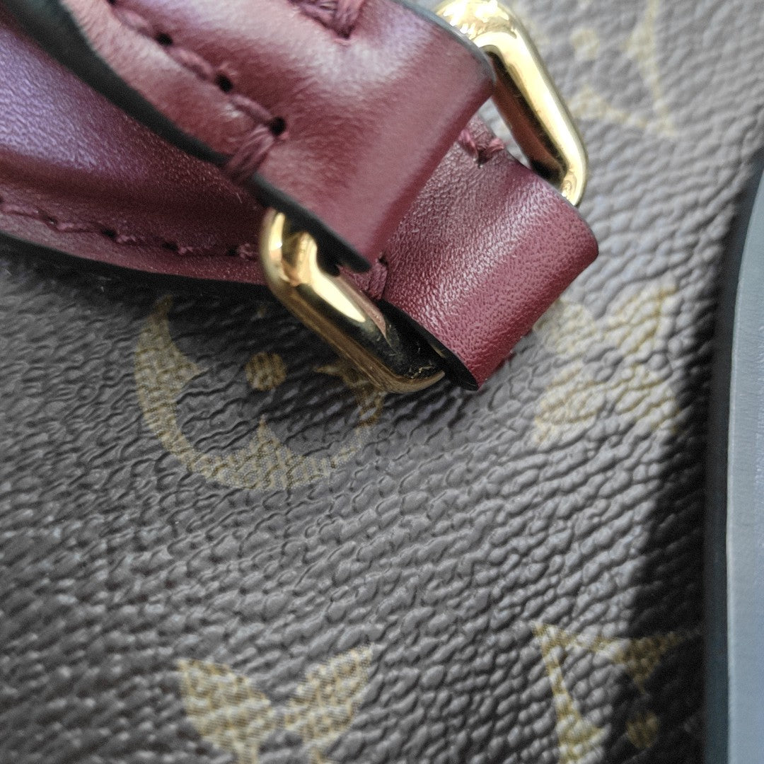 TUILERIES Monogram Coated Canvas Brown