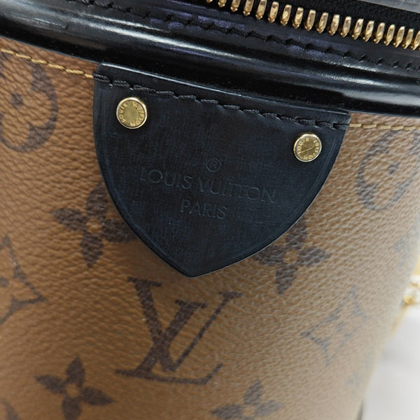 CANNES PM Monogram Coated Canvas Brown