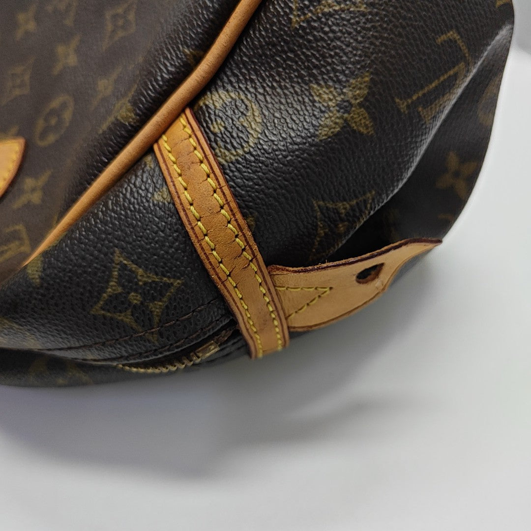 MONTORGUEI PM Monogram Coated Canvas Brown