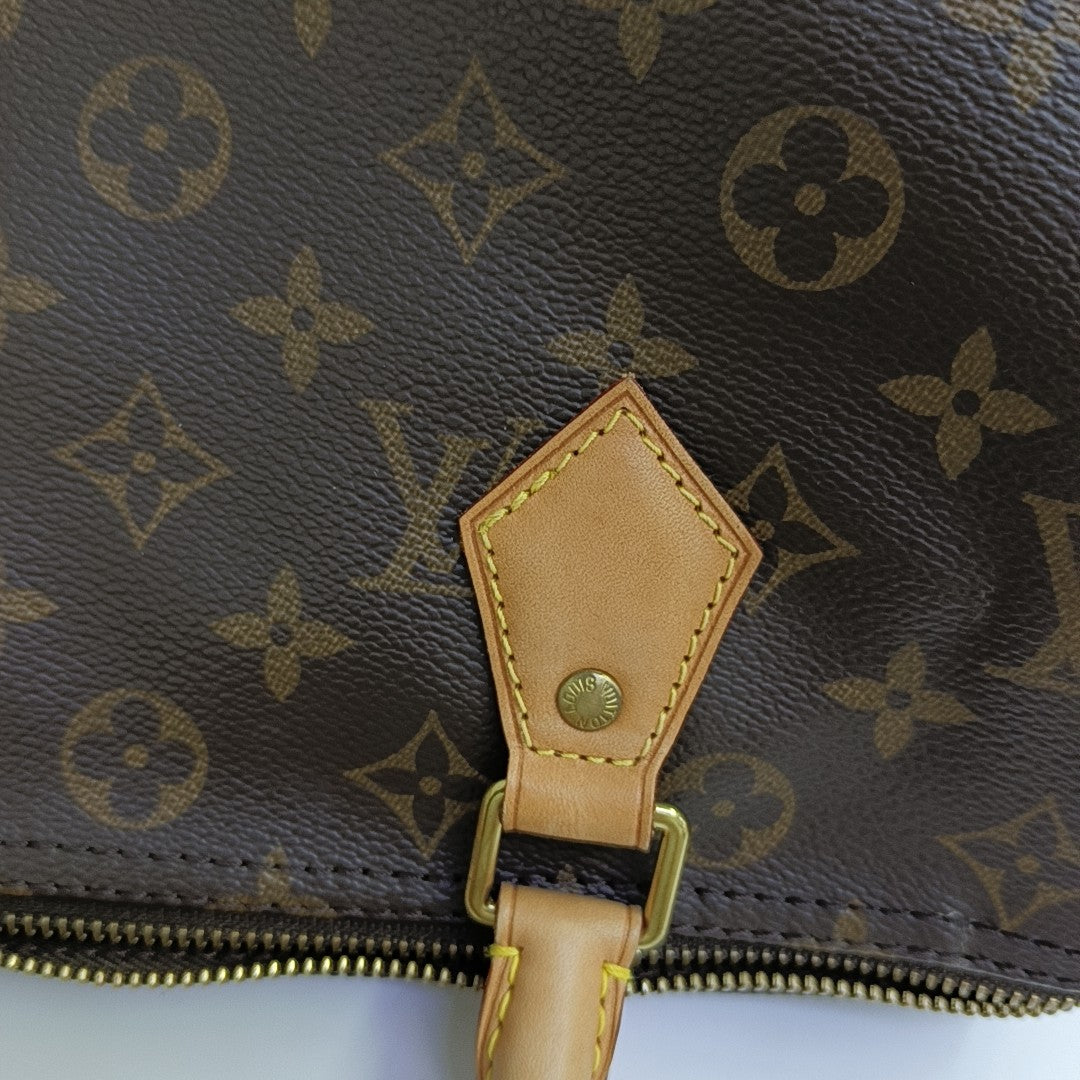 SPEEDY 30 Monogram Coated Canvas Brown