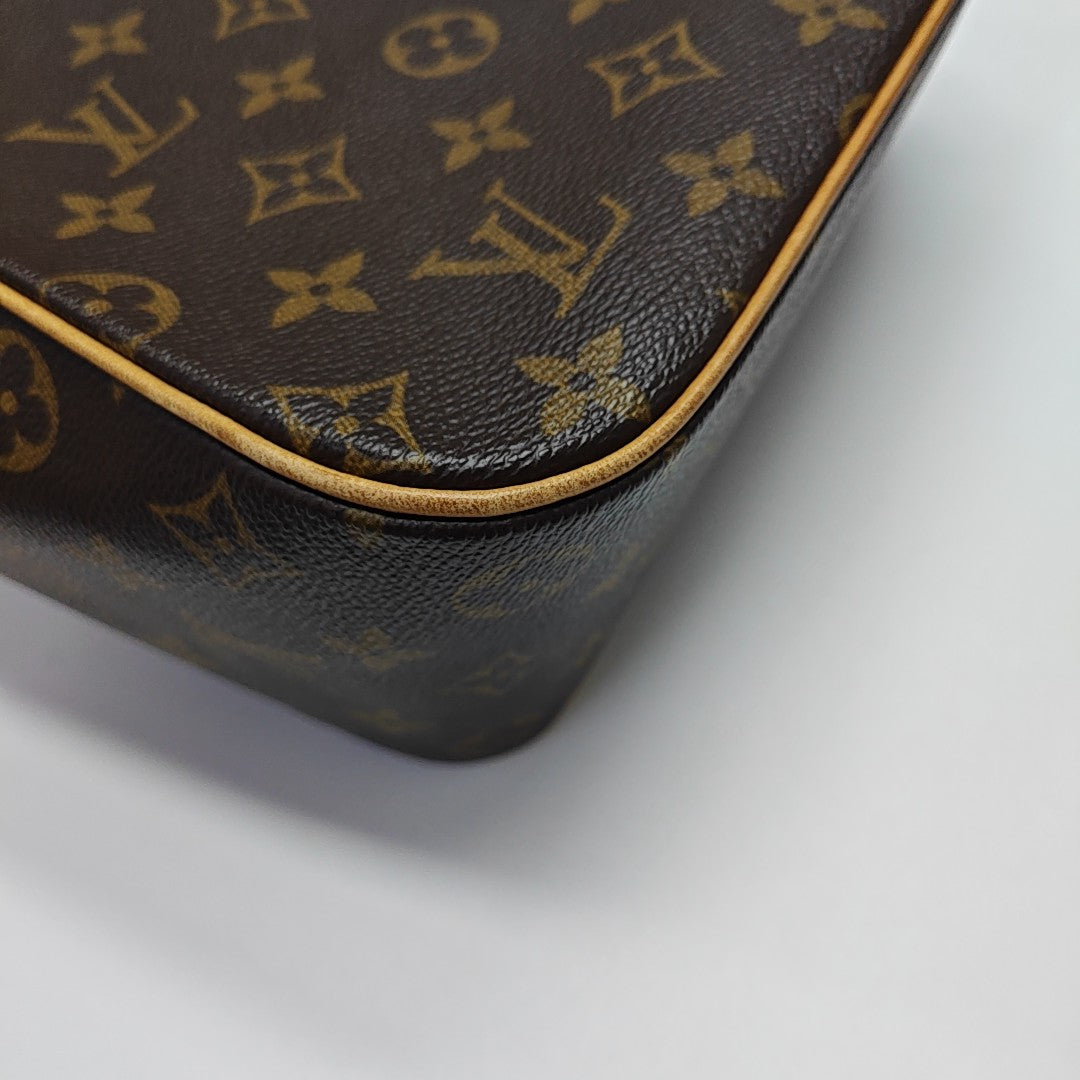 EXCENTRI-CITE Monogram Coated Canvas Brown