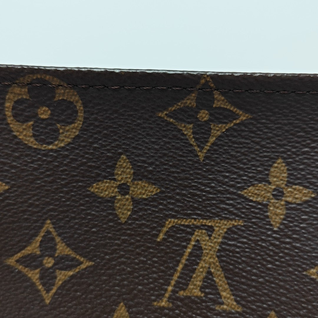 TOILET POCKET 19 Monogram Coated Canvas Brown