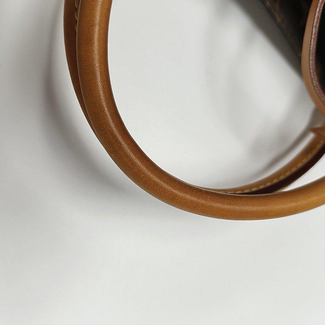 MONTAIGNE Monogram Coated Canvas Brown