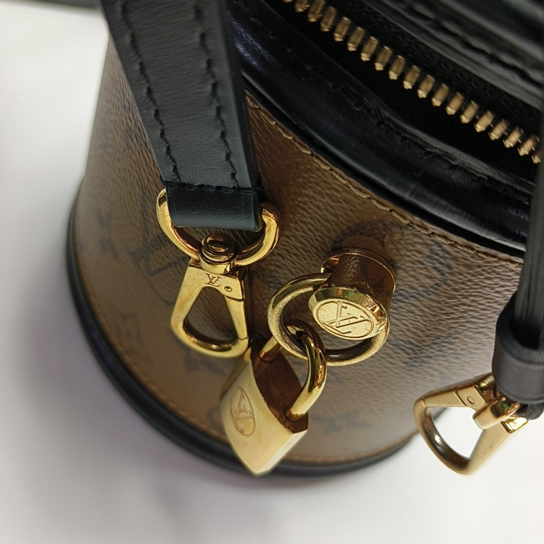 CANNES PM Monogram Coated Canvas Brown