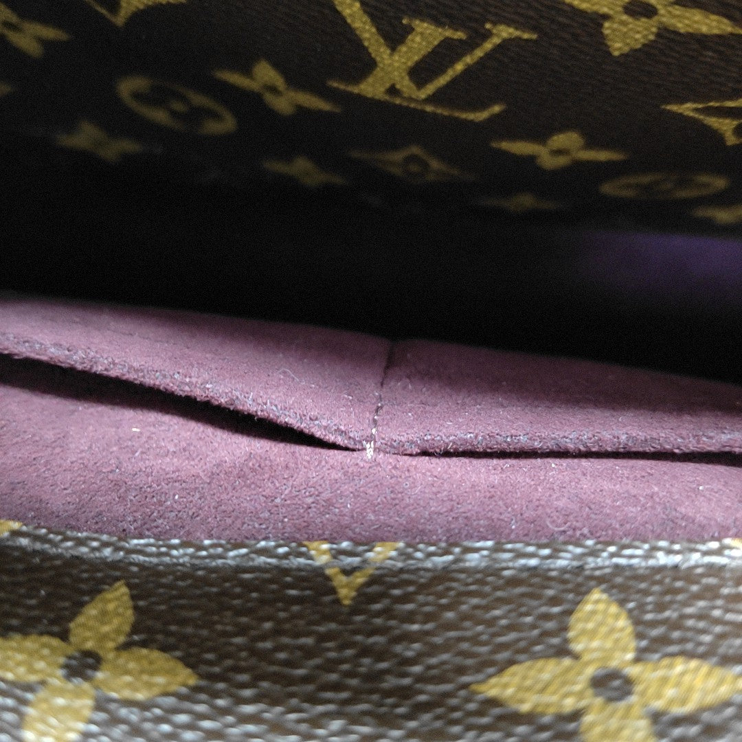MONTAIGNE GM Monogram Coated Canvas Brown