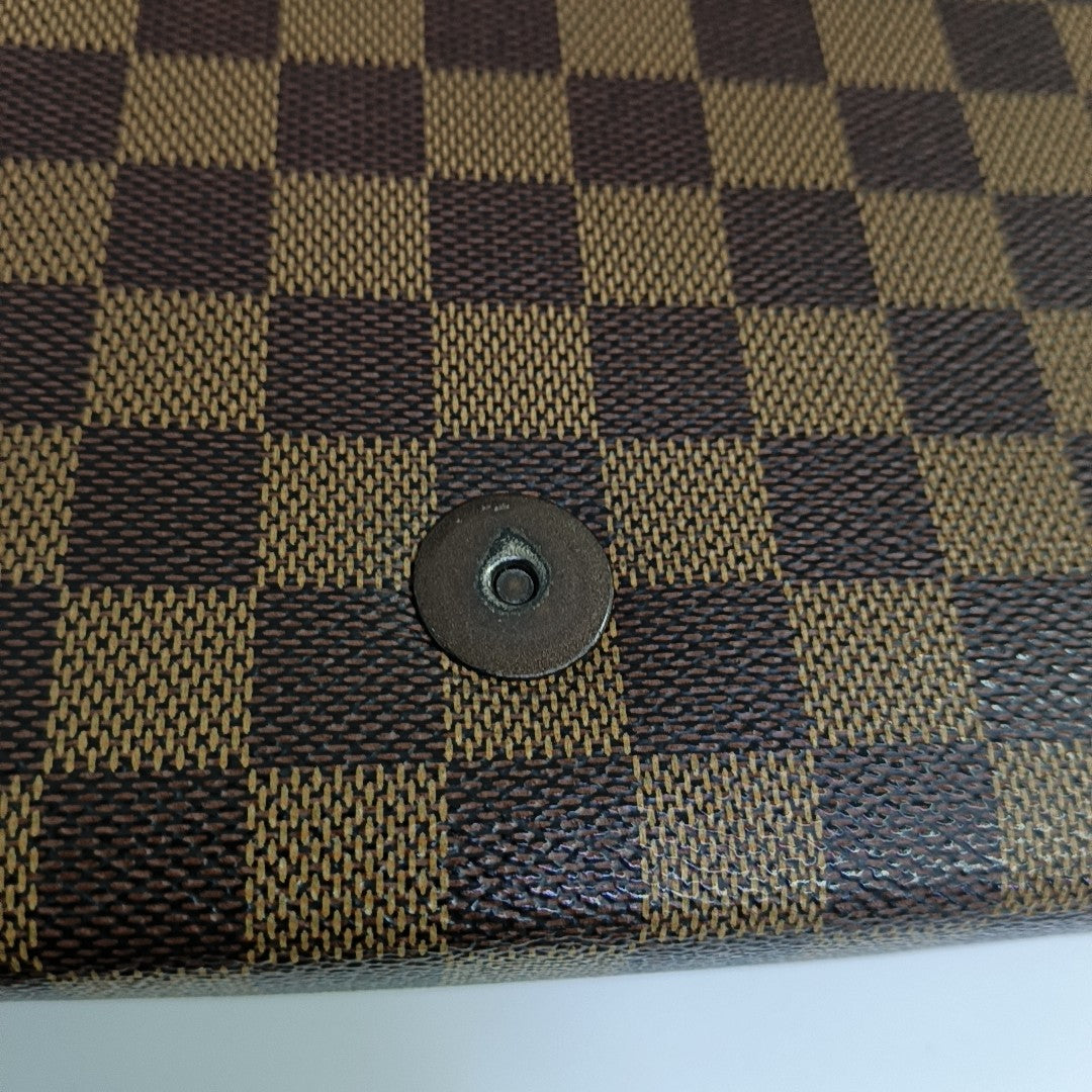 TRIBECA Damier Ebene Coated Canvas Brown